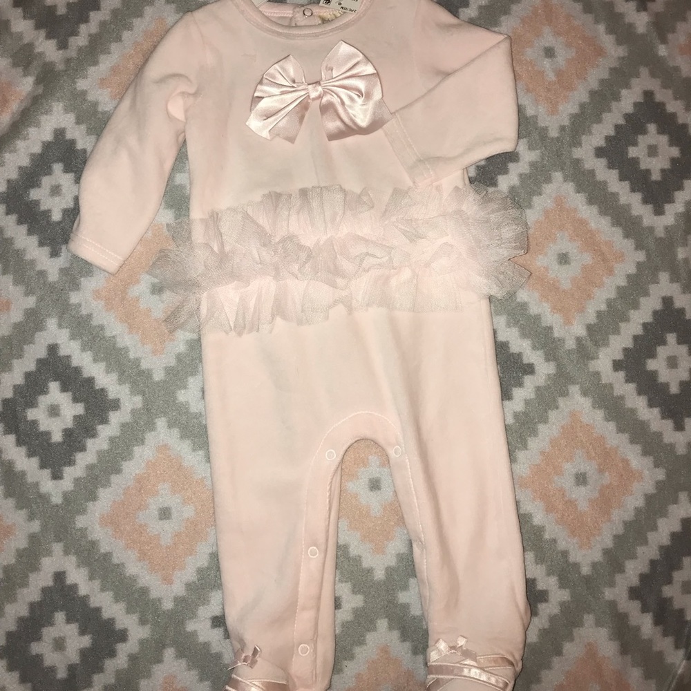 First impressions ruffle one piece